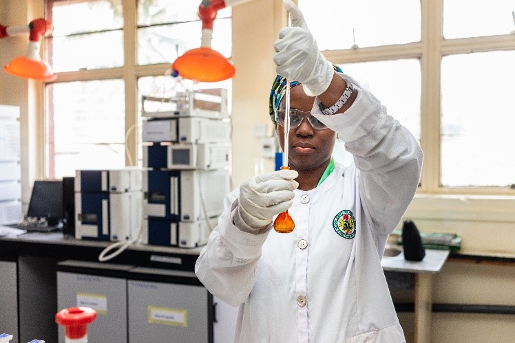 Analyst at CDC Yaba Nigeria working in a lab