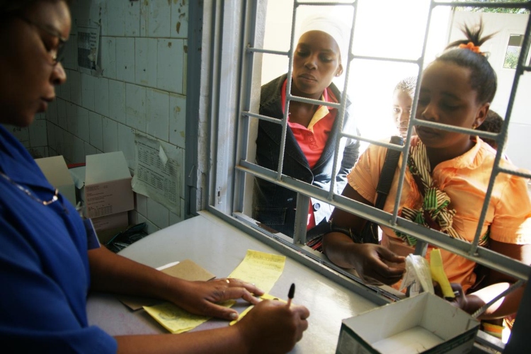 A pharmacist in Chokwe, Mozambique, dispenses Coartem